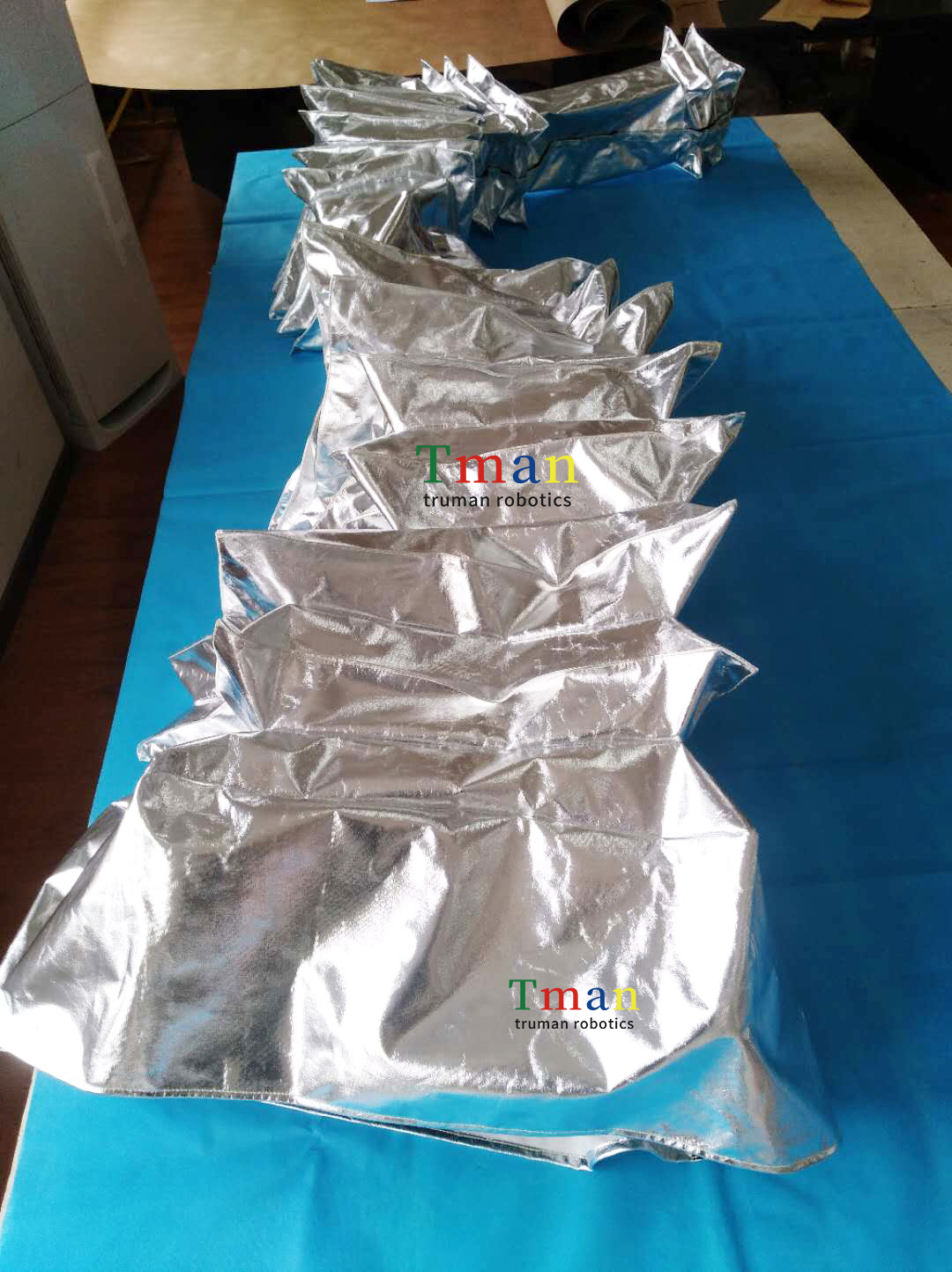 安川 MH24机器人耐热防护衣在工业上的应用